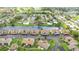 Aerial view of community, highlighting building location and waterfront access at 1743 Lake Pl # 1743C, Venice, FL 34293