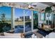 Sunroom with sliding glass doors offering scenic water views at 250 Santa Maria St # 118, Venice, FL 34285