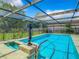 Inviting screened-in pool with a spacious patio area at 2512 Regatta Dr, Sarasota, FL 34231