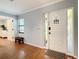 Light and airy entryway with hardwood floors at 2512 Regatta Dr, Sarasota, FL 34231