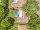Aerial view of the house showing pool and backyard at 2512 Regatta Dr, Sarasota, FL 34231