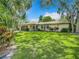 Charming single story home with lush landscaping at 2512 Regatta Dr, Sarasota, FL 34231