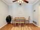 Dining room featuring wood table and chairs, and a ceiling fan at 2512 Regatta Dr, Sarasota, FL 34231
