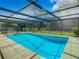 Large screened-in pool and backyard at 2512 Regatta Dr, Sarasota, FL 34231