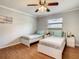 Bedroom with two twin beds and hardwood floors at 2512 Regatta Dr, Sarasota, FL 34231