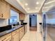 Updated kitchen with stainless steel appliances and granite countertops at 2512 Regatta Dr, Sarasota, FL 34231