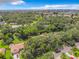 Aerial view showcasing the home's neighborhood and surrounding landscape at 2512 Regatta Dr, Sarasota, FL 34231