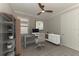 Home office featuring a desk, chair, and built-in shelving at 257 Teramo Way, Nokomis, FL 34275