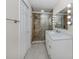 Updated bathroom with modern vanity and walk-in shower at 3331 Traverse Ave, North Port, FL 34286