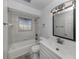 Clean bathroom with updated vanity and bathtub at 3331 Traverse Ave, North Port, FL 34286