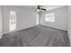 Bright bedroom featuring grey carpet and neutral walls at 3331 Traverse Ave, North Port, FL 34286