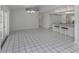 Open concept living space with tile floors and kitchen island at 3331 Traverse Ave, North Port, FL 34286