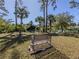 Tranquil waterfront view with a park bench at 3331 Traverse Ave, North Port, FL 34286