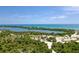 Drone view of a tranquil coastal area with water access at 3390 Dover Dr, Punta Gorda, FL 33983