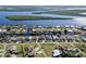 Wide aerial view of a waterfront community with lush greenery and canals at 3390 Dover Dr, Punta Gorda, FL 33983