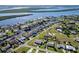 Aerial view of waterfront homes, showcasing a tranquil canal-side community at 3390 Dover Dr, Punta Gorda, FL 33983
