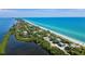 Aerial view of beachfront homes and coastline at 3390 Dover Dr, Punta Gorda, FL 33983