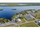 Expansive aerial view showcasing waterfront property and recreational facilities at 3390 Dover Dr, Punta Gorda, FL 33983