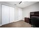 Bedroom with double door closet and home office space at 3390 Dover Dr, Punta Gorda, FL 33983
