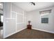 Bright bedroom with decorative wall paneling and window seat at 3390 Dover Dr, Punta Gorda, FL 33983