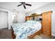 Relaxing bedroom with king-size bed and built-in wooden cabinetry at 3390 Dover Dr, Punta Gorda, FL 33983