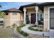 Well-maintained home with a welcoming front entrance and landscaped walkway at 3390 Dover Dr, Punta Gorda, FL 33983