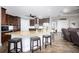 Modern kitchen with granite countertops and dark wood cabinets at 3390 Dover Dr, Punta Gorda, FL 33983