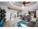 Spacious living room with comfortable seating and access to the patio at 3390 Dover Dr, Punta Gorda, FL 33983