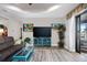 Spacious living room with a large TV and plenty of natural light at 3390 Dover Dr, Punta Gorda, FL 33983