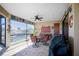 Screened patio features a table and chairs, perfect for outdoor dining at 3390 Dover Dr, Punta Gorda, FL 33983