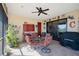 Spacious screened patio with seating area and grill, offering water views at 3390 Dover Dr, Punta Gorda, FL 33983