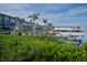 Waterfront view of modern building and docked boats at 3390 Dover Dr, Punta Gorda, FL 33983