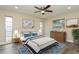 Spacious bedroom with a dresser and stylish bedding at 352 Gardenia Rd, Venice, FL 34293