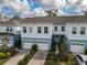 Modern two-story home with attached garage and landscaped yard at 4008 Via Sienna Cir, Sarasota, FL 34243