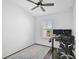 Bright office with a standing desk, chair, and window views at 4008 Via Sienna Cir, Sarasota, FL 34243