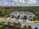Community of townhouses with ample parking and landscaping at 4008 Via Sienna Cir, Sarasota, FL 34243