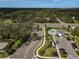 Aerial view of community amenities, including a pool, parking, and landscaped areas at 4008 Via Sienna Cir, Sarasota, FL 34243