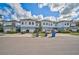 Townhouses with garages and landscaping at 4008 Via Sienna Cir, Sarasota, FL 34243