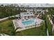 Relaxing community pool area, featuring a cabana and plenty of lounge chairs for residents at 4008 Via Sienna Cir, Sarasota, FL 34243