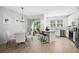 Kitchen dining area with table and chairs, leading to a patio at 4008 Via Sienna Cir, Sarasota, FL 34243