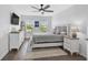 Spacious main bedroom with a king-size bed and plenty of natural light at 4008 Via Sienna Cir, Sarasota, FL 34243
