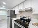 Stainless steel appliances and modern kitchen design at 4507 3Rd Street W Cir # 477, Bradenton, FL 34207