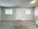 Bright living room featuring wood-look floors and neutral walls at 4507 3Rd Street W Cir # 477, Bradenton, FL 34207