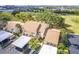 Aerial view of condo building with surrounding landscape at 688 Bird Bay Cir # 27, Venice, FL 34285