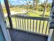 Wooden deck overlooking the backyard and neighborhood at 7 Aback Ct, Placida, FL 33946