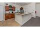 Well-equipped community kitchen with granite counters and ample cabinetry at 900 San Lino Cir # 922, Venice, FL 34292