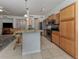 Modern kitchen with granite countertops and stainless steel appliances at 900 San Lino Cir # 922, Venice, FL 34292