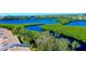 Waterfront property with lush vegetation at 1040 Bird Bay Way #283 Bld 40 # 283, Venice, FL 34293