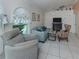 Living room with a fireplace and comfortable seating at 1063 General St, Port Charlotte, FL 33953