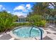 Community hot tub with surrounding landscaping at 12261 Stuart Dr, Venice, FL 34293